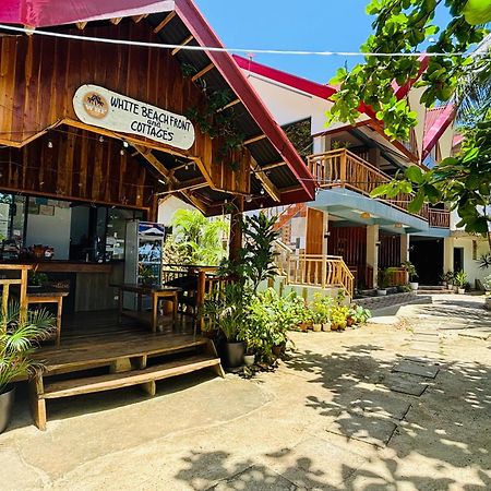 ไวต์ บีช ฟรอนต์ แอนด์ คอตเทจส์ ฮีนุกตัน รีสอร์ต อิน บูรูอังกา Villa Buruanga ภายนอก รูปภาพ