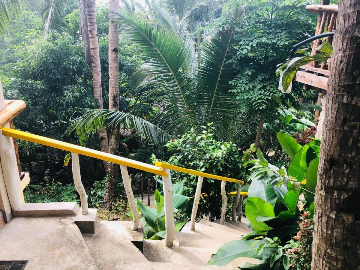 ไวต์ บีช ฟรอนต์ แอนด์ คอตเทจส์ ฮีนุกตัน รีสอร์ต อิน บูรูอังกา Villa Buruanga ภายนอก รูปภาพ