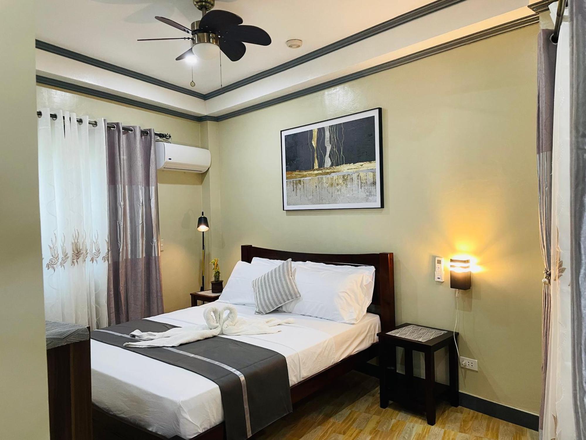 ไวต์ บีช ฟรอนต์ แอนด์ คอตเทจส์ ฮีนุกตัน รีสอร์ต อิน บูรูอังกา Villa Buruanga ภายนอก รูปภาพ