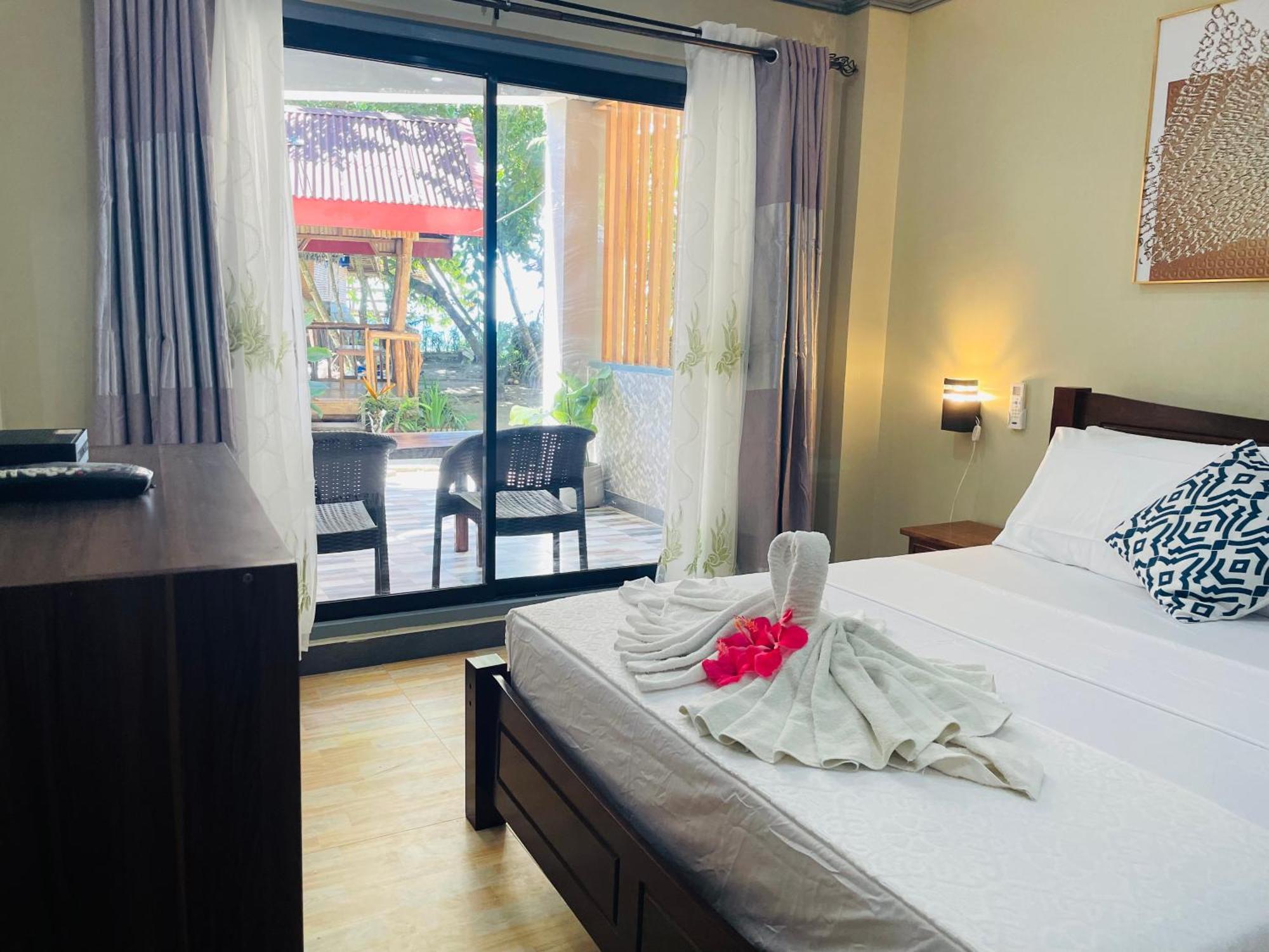 ไวต์ บีช ฟรอนต์ แอนด์ คอตเทจส์ ฮีนุกตัน รีสอร์ต อิน บูรูอังกา Villa Buruanga ภายนอก รูปภาพ