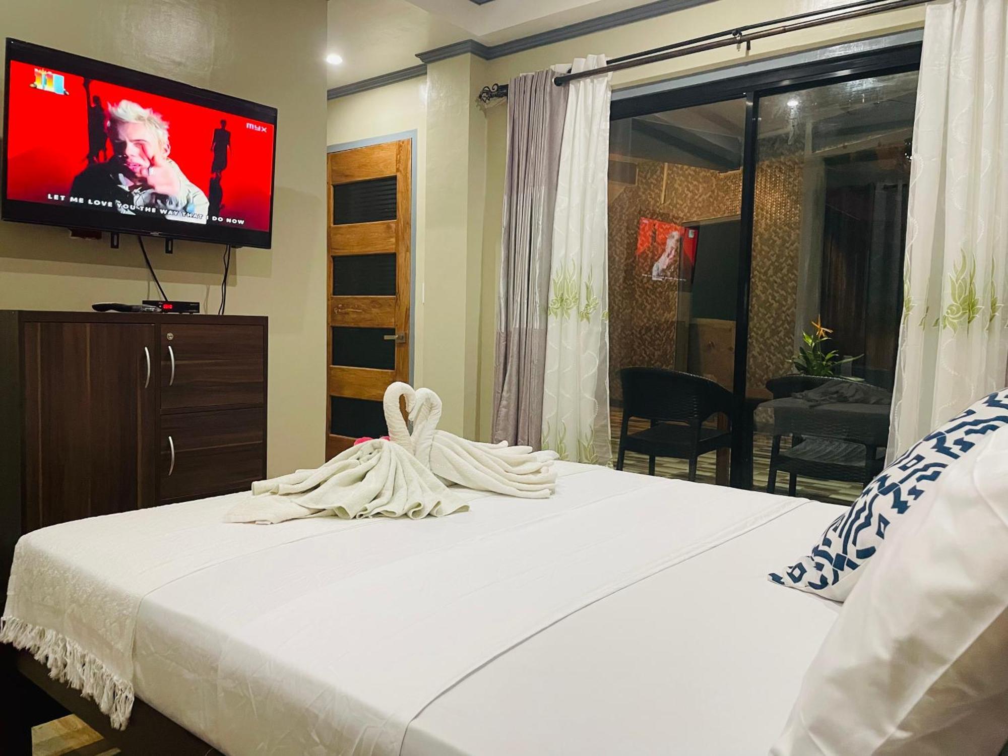 ไวต์ บีช ฟรอนต์ แอนด์ คอตเทจส์ ฮีนุกตัน รีสอร์ต อิน บูรูอังกา Villa Buruanga ภายนอก รูปภาพ