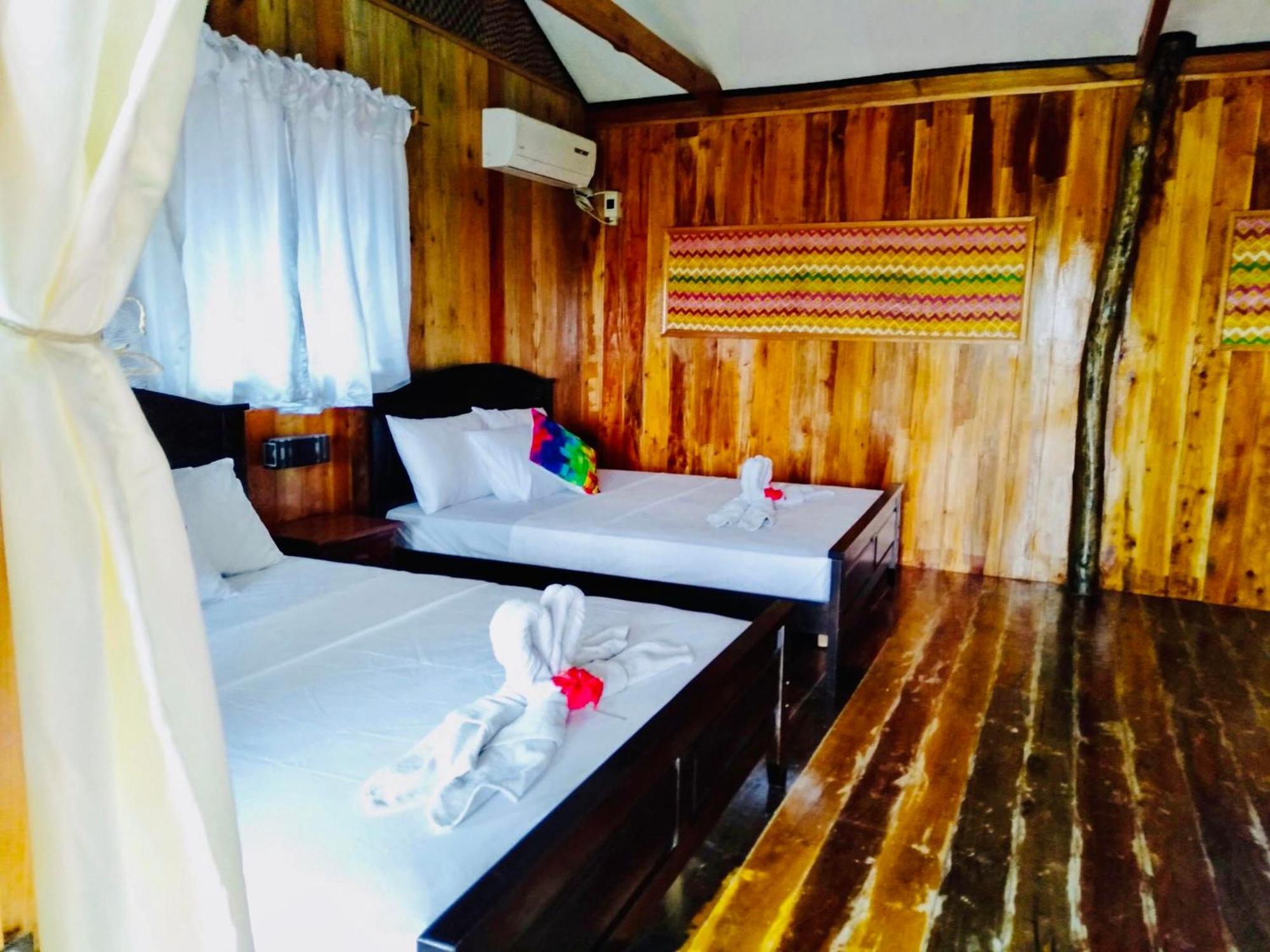 ไวต์ บีช ฟรอนต์ แอนด์ คอตเทจส์ ฮีนุกตัน รีสอร์ต อิน บูรูอังกา Villa Buruanga ห้อง รูปภาพ
