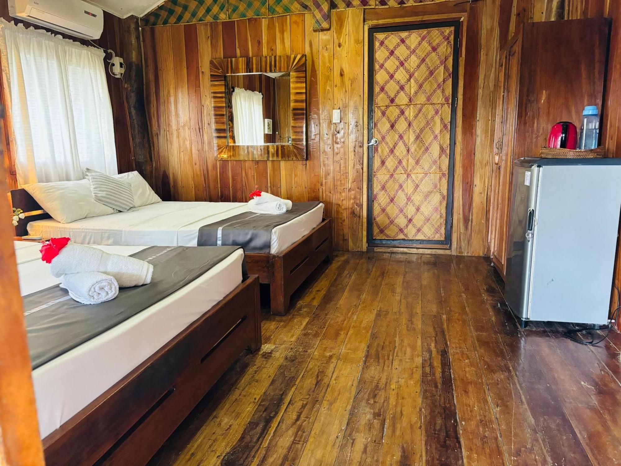 ไวต์ บีช ฟรอนต์ แอนด์ คอตเทจส์ ฮีนุกตัน รีสอร์ต อิน บูรูอังกา Villa Buruanga ภายนอก รูปภาพ