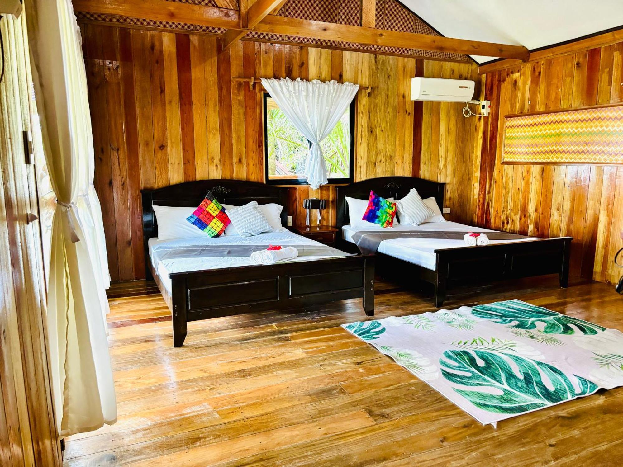 ไวต์ บีช ฟรอนต์ แอนด์ คอตเทจส์ ฮีนุกตัน รีสอร์ต อิน บูรูอังกา Villa Buruanga ภายนอก รูปภาพ