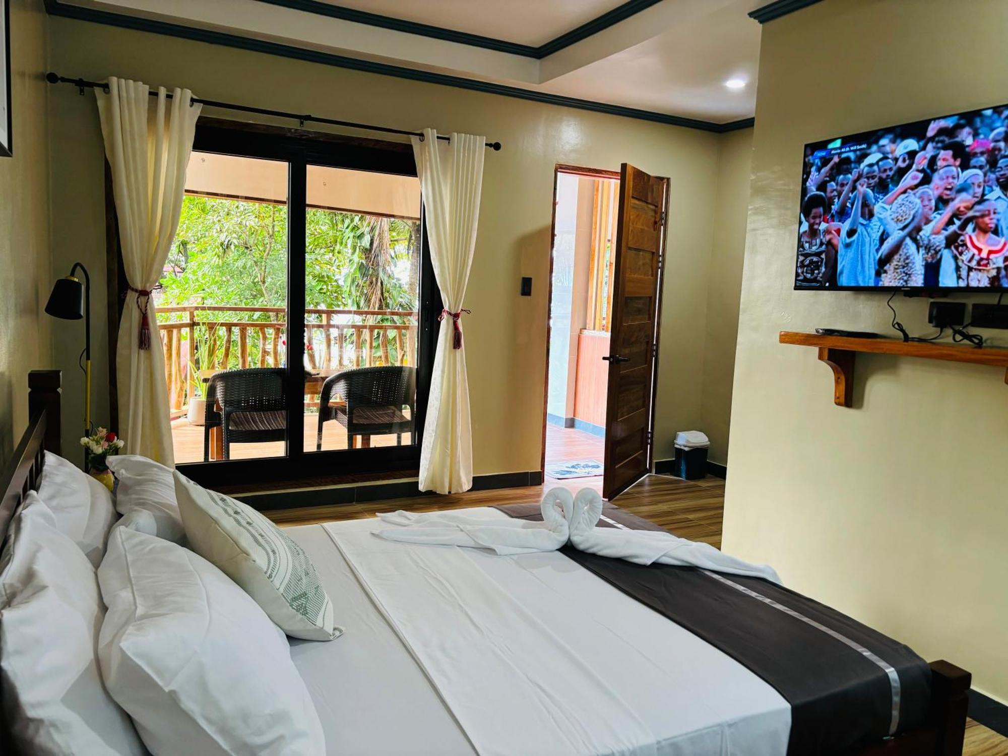 ไวต์ บีช ฟรอนต์ แอนด์ คอตเทจส์ ฮีนุกตัน รีสอร์ต อิน บูรูอังกา Villa Buruanga ภายนอก รูปภาพ