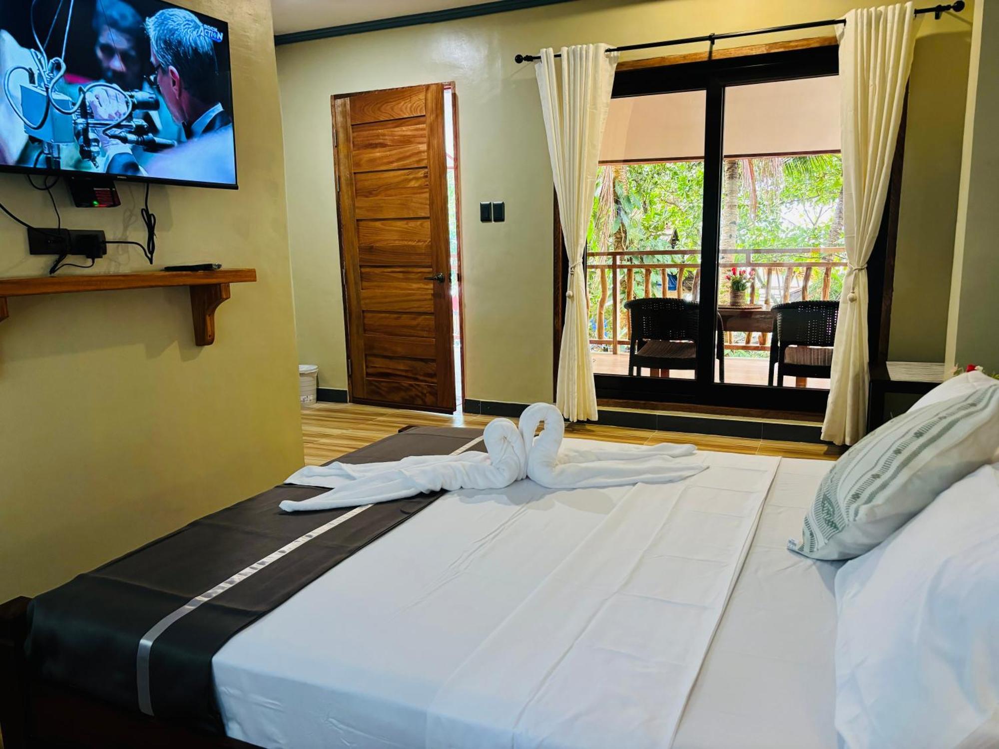 ไวต์ บีช ฟรอนต์ แอนด์ คอตเทจส์ ฮีนุกตัน รีสอร์ต อิน บูรูอังกา Villa Buruanga ภายนอก รูปภาพ