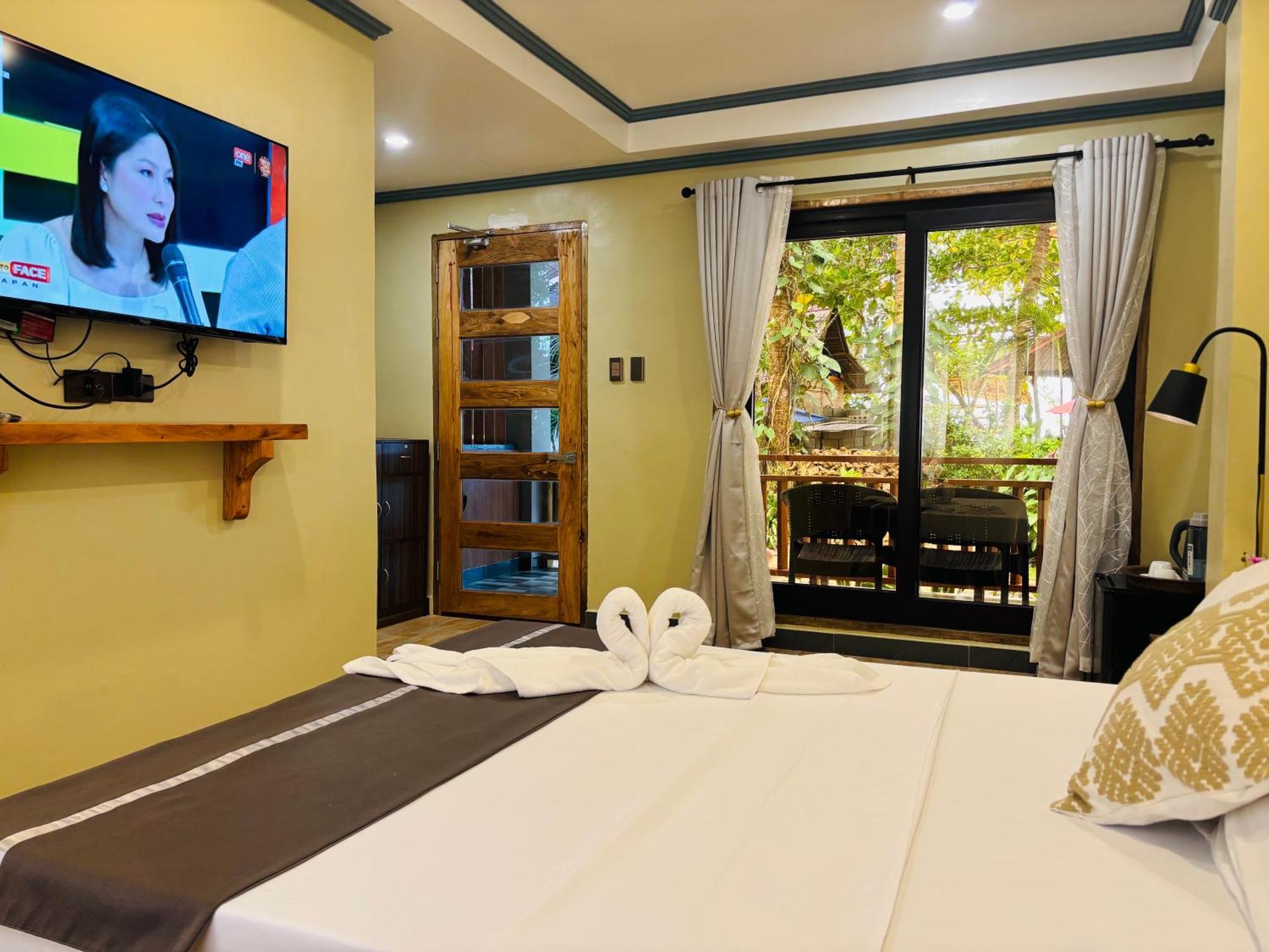 ไวต์ บีช ฟรอนต์ แอนด์ คอตเทจส์ ฮีนุกตัน รีสอร์ต อิน บูรูอังกา Villa Buruanga ภายนอก รูปภาพ