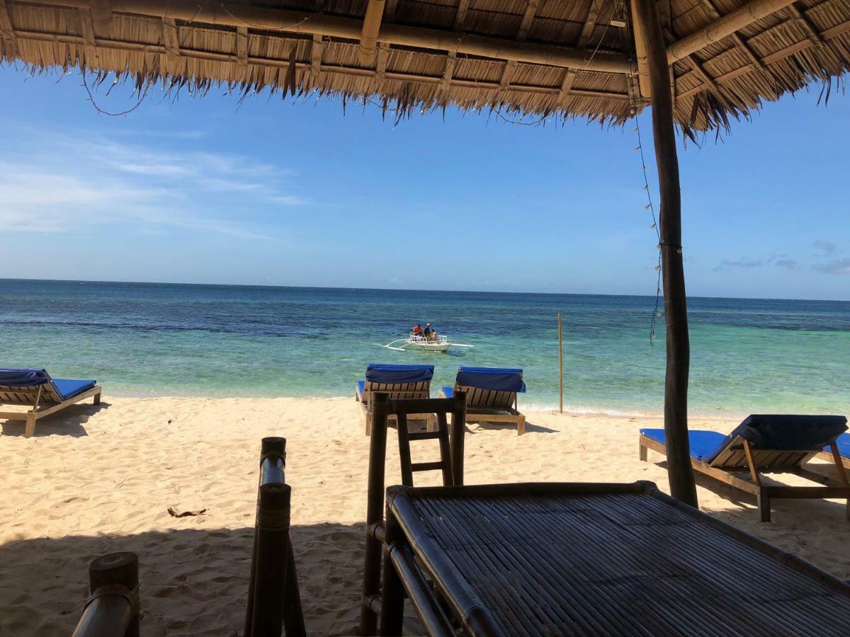 ไวต์ บีช ฟรอนต์ แอนด์ คอตเทจส์ ฮีนุกตัน รีสอร์ต อิน บูรูอังกา Villa Buruanga ภายนอก รูปภาพ