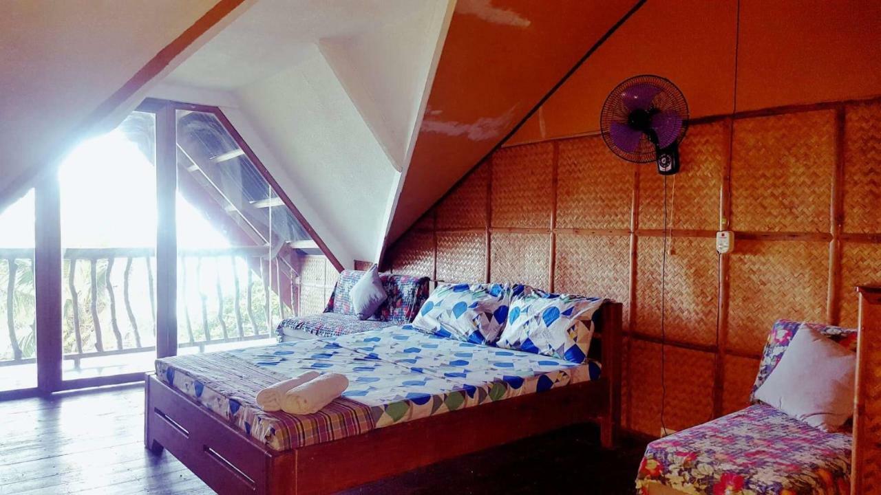 ไวต์ บีช ฟรอนต์ แอนด์ คอตเทจส์ ฮีนุกตัน รีสอร์ต อิน บูรูอังกา Villa Buruanga ภายนอก รูปภาพ